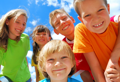 group of smiling children with healthy teeth