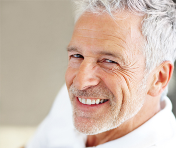 elderly man with bright smile